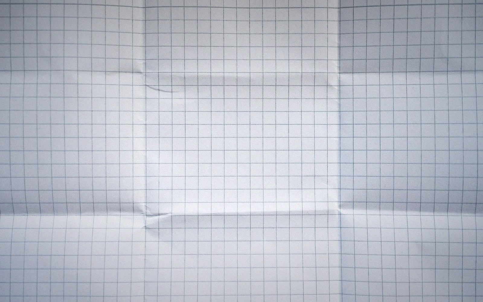 A printed grid sheet with one cell knocked out of line