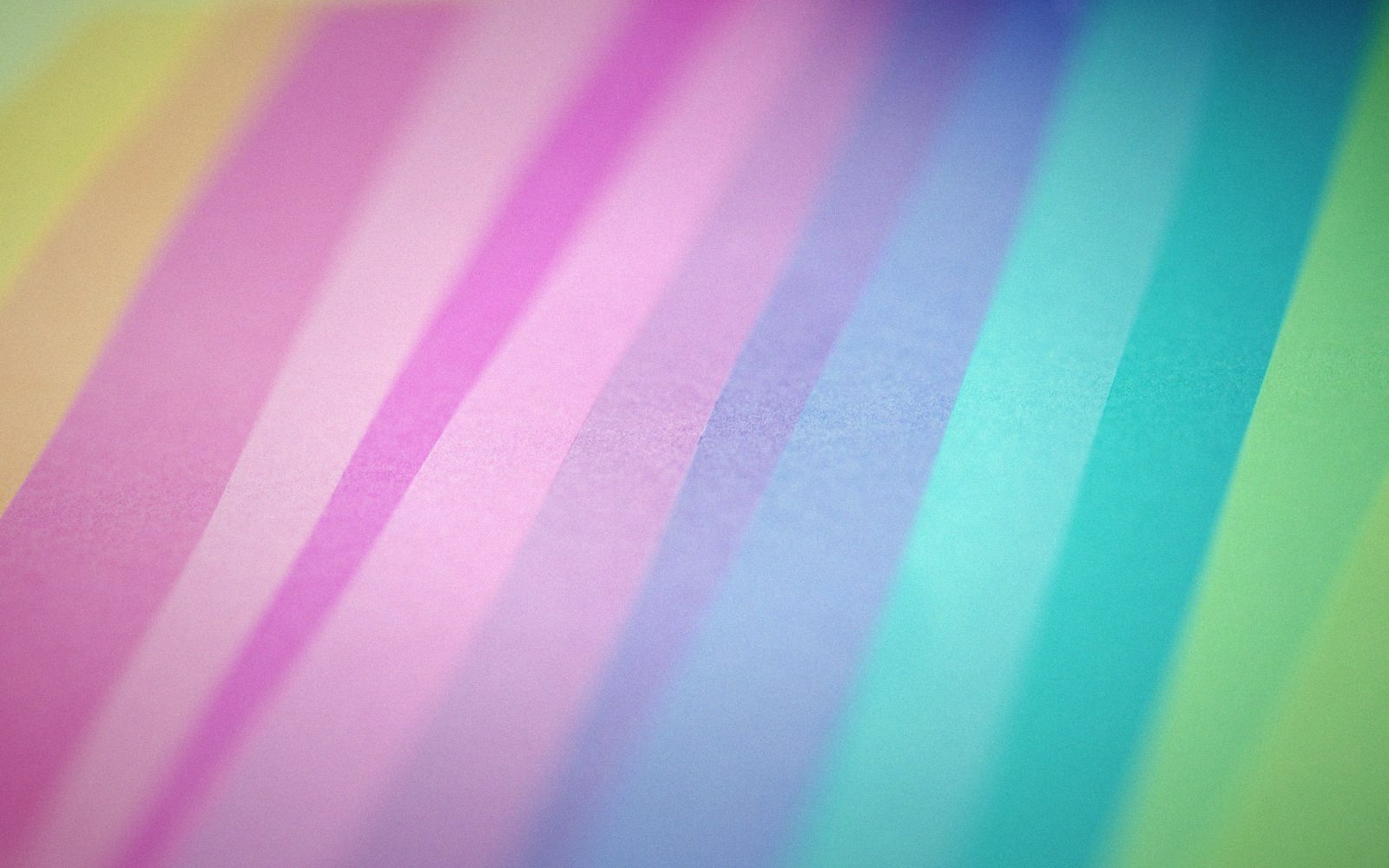 Diagonal pastel-colored stripes transition smoothly from yellow to pink to blue and green